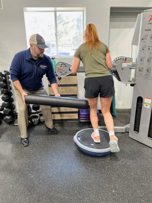 Mike training an athlete on proprioception and balance